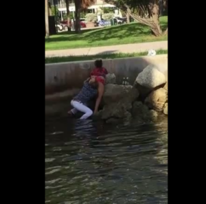 couple sucking in the  lake