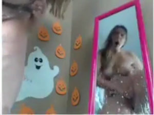 Woman in front of the mirror, very hot